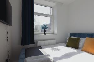 Postel nebo postele na pokoji v ubytování High Wycombe Commuters Rental