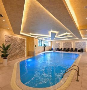 Bazén v ubytování Blue Lux nebo v jeho okolí