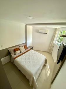 Voodi või voodid majutusasutuse Atlântico Norte Lazer completo à Beira-mar toas