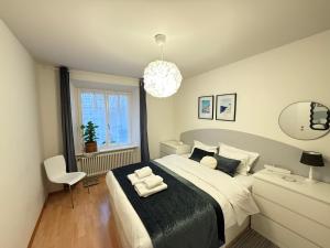 Postel nebo postele na pokoji v ubytování Waldshut -Kaiser55 + 37 fotografií