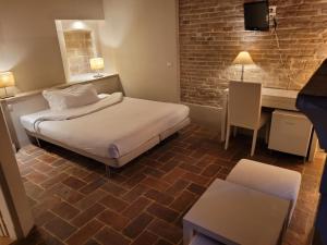 Voodi või voodid majutusasutuse Relais Casetta56 toas