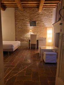 Voodi või voodid majutusasutuse Relais Casetta56 toas