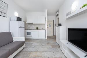 Kuchyň nebo kuchyňský kout v ubytování Casa Vacanze Lo Squalo + 22 fotografií