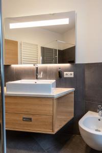 Ein Badezimmer in der Unterkunft Der Unterwirt Guesthouse and Restaurant