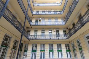 an internal view of a building with balconies at Buda or Pest in Budapest