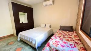 Llit o llits en una habitació de Chacara com lazer completo, Wi-Fi e pet friendly