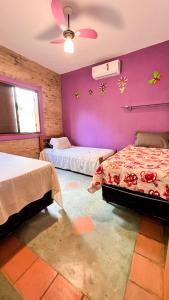 Llit o llits en una habitació de Chacara com lazer completo, Wi-Fi e pet friendly