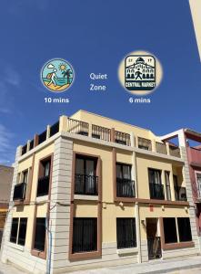 a building with the names of different cities at La huerta centro in Alicante