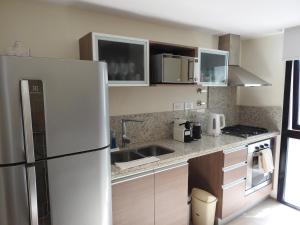 Η κουζίνα ή μικρή κουζίνα στο Residencia Developer - Los Troncos