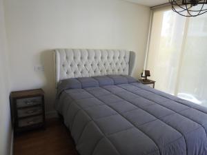 Ένα ή περισσότερα κρεβάτια σε δωμάτιο στο Residencia Developer - Los Troncos