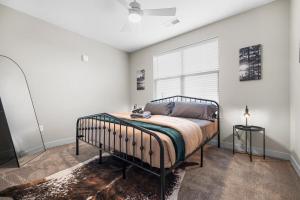 a bedroom with a bed and a window at IRIE Living, Replenish Kg 2Bd Gym Pool BRAND NEW in Whitestown +27 photos