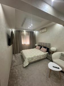 Ένα ή περισσότερα κρεβάτια σε δωμάτιο στο Luxury appartement in agadir bay