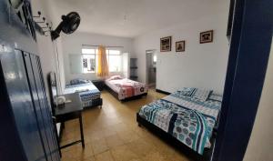 Voodi või voodid majutusasutuse Hotel Guaipa Melgar toas