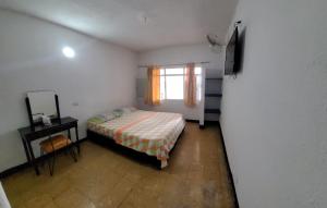 Postel nebo postele na pokoji v ubytování Hotel Guaipa Melgar
