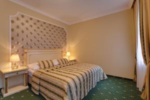 Posteľ alebo postele v izbe v ubytovaní Hotel Saint Petersburg