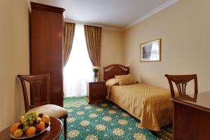 Posteľ alebo postele v izbe v ubytovaní Hotel Saint Petersburg