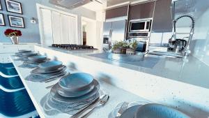 Kuchyň nebo kuchyňský kout v ubytování Wunderschönes Apartment direkt am Strand