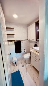 Kuchyň nebo kuchyňský kout v ubytování Wunderschönes Apartment direkt am Strand + 27 fotografií
