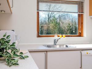 Kuchyň nebo kuchyňský kout v ubytování Holiday home Skals VI