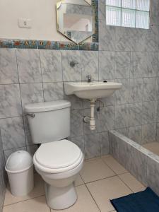 Koupelna v ubytování Casa Verdi + 13 fotografií