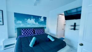 Postel nebo postele na pokoji v ubytování Wunderschönes Apartment direkt am Strand