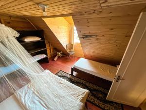 Postel nebo postele na pokoji v ubytování Cabanas rústica