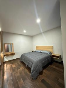 Postel nebo postele na pokoji v ubytování MR Hotel