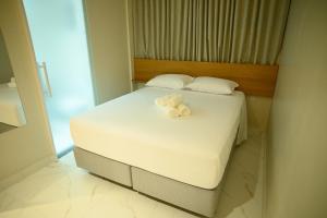 Postel nebo postele na pokoji v ubytování Viso Hotel