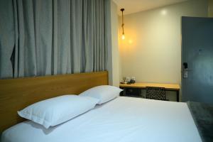 Postel nebo postele na pokoji v ubytování Viso Hotel