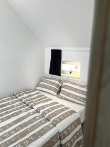 Apartments Linden Tree客房内的一张或多张床位