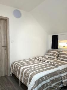 Apartments Linden Tree客房内的一张或多张床位
