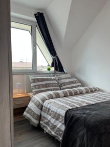 Apartments Linden Tree客房内的一张或多张床位