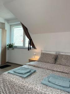 Apartments Linden Tree客房内的一张或多张床位