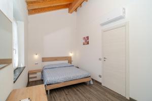 Postel nebo postele na pokoji v ubytování Il Vigneto