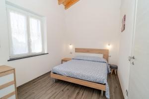 Postel nebo postele na pokoji v ubytování Il Vigneto