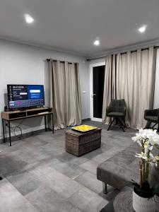 TV a/nebo společenská místnost v ubytování Casa do Facho