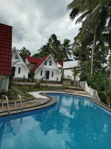 Kolam renang di atau dekat dengan Sambas Cottages