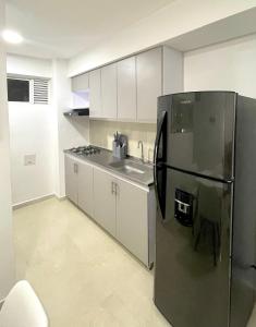 Η κουζίνα ή μικρή κουζίνα στο Acogedor y elegante Apartamento