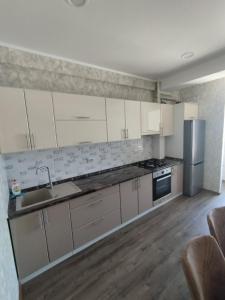 Η κουζίνα ή μικρή κουζίνα στο Central Double Budget Room Бюджетная комната для двоих в центре