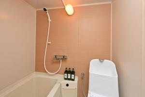 Koupelna v ubytování Komakusa Hotel