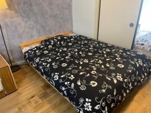 Fukuoka Condominium客房内的一张或多张床位