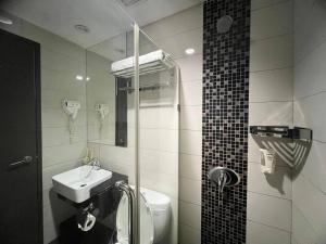 Ванная комната в Dreamtel Kota Kinabalu