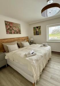 Postel nebo postele na pokoji v ubytování Apartments 1 Valečov-Zásadka 7