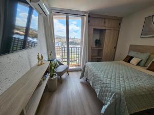 Postel nebo postele na pokoji v ubytování Opal-203 Condominio Confortable en Ecodistrito