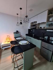 Kuchyň nebo kuchyňský kout v ubytování Opal-203 Condominio Confortable en Ecodistrito