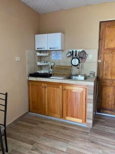 Kuchyň nebo kuchyňský kout v ubytování Apartamento estudio