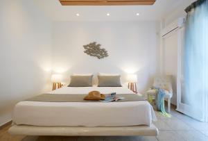 Krevet ili kreveti u jedinici u okviru objekta Hermes Hotel