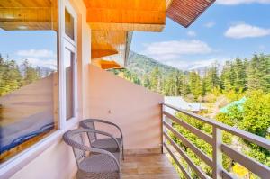 Foto sihtkohas Manāli asuva majutusasutuse !!! Hotel The Nirvana Hills By Hotel Manu !!! A Luxury Stay With Mountain View!!!Couple Friendly!!! Balcony Rooms!!!Open Terrace With 360 View!!! galeriist
