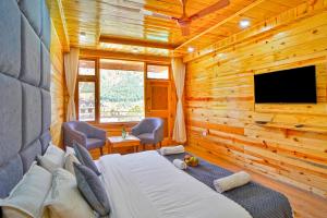 Foto sihtkohas Manāli asuva majutusasutuse !!! Hotel The Nirvana Hills By Hotel Manu !!! A Luxury Stay With Mountain View!!!Couple Friendly!!! Balcony Rooms!!!Open Terrace With 360 View!!! galeriist