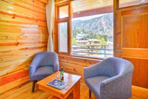Foto sihtkohas Manāli asuva majutusasutuse !!! Hotel The Nirvana Hills By Hotel Manu !!! A Luxury Stay With Mountain View!!!Couple Friendly!!! Balcony Rooms!!!Open Terrace With 360 View!!! galeriist